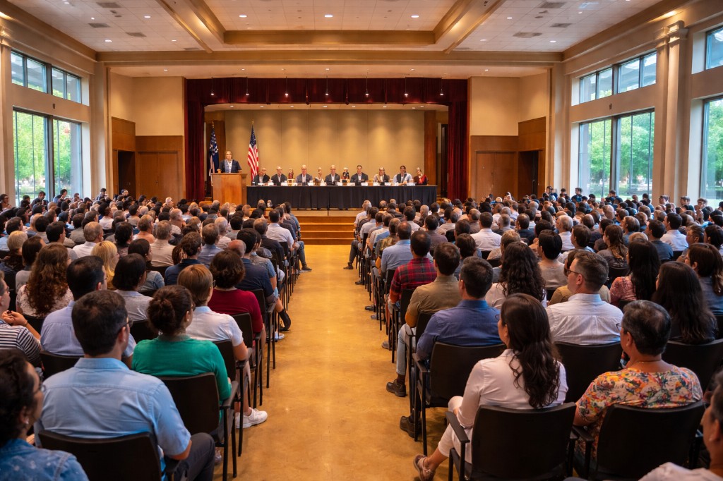 Town hall community meeting with audience and panel